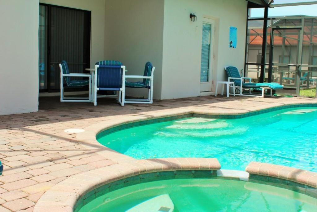 Four Corners Villa | 4 bedrooms pool home Gated resort of High Grove