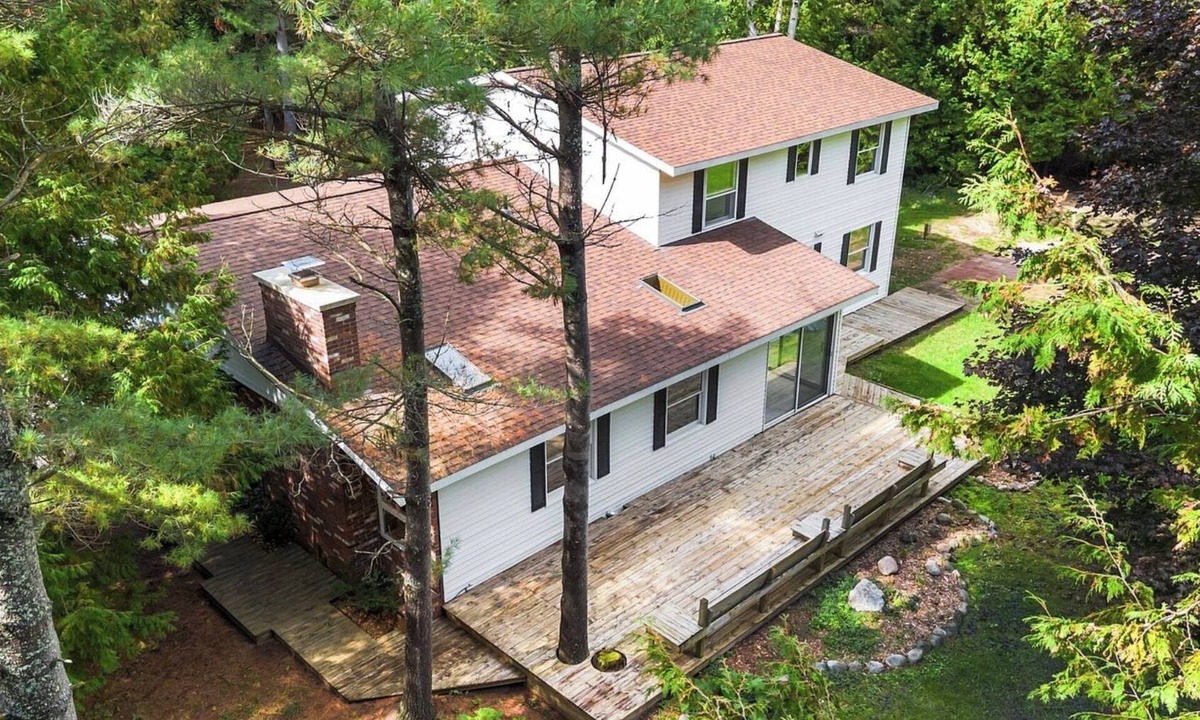 Cheboygan House | 4BR house in Cheboygan with a game room and a private boat slip nearby