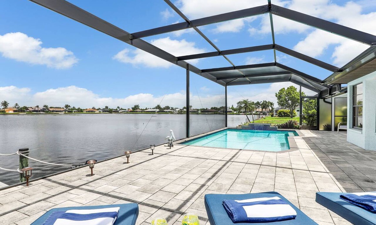 Pelican House | 80-ft Waterfront Resort-like Retreat to Relax; Heated Pool, Jacuzzi, Bikes, Pier