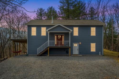 Great Cacapon House | All Decked Up - wifi, view, river access, fire pit, 3 bedrooms, games, family friendly
