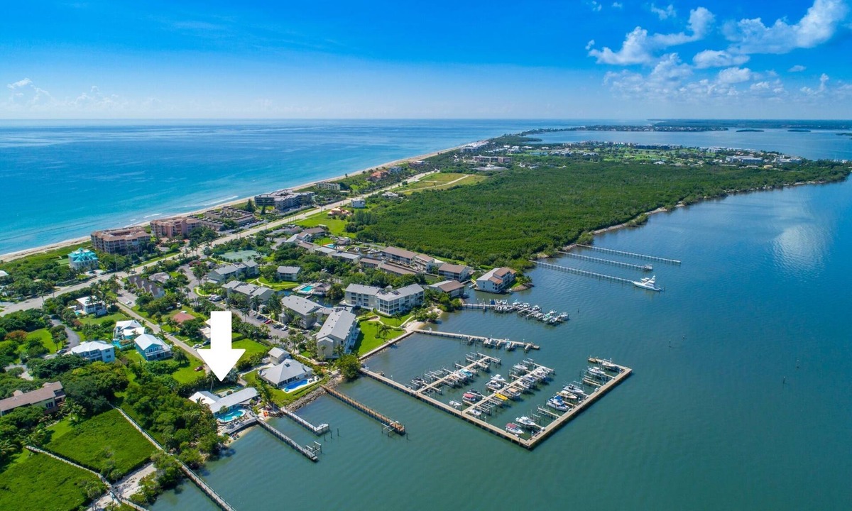 Stuart House | Aquatopia North: Riverfront beach house, w/dock, heated pool + hot tub & more!