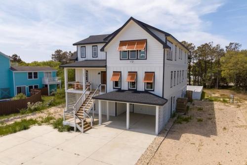 Whalehead Beach House | Aurora 6 BR Elevator Theater Rec Room Pool & Hot