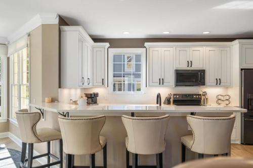 Bay Harbor House | Barefoot Luxury 24: A spacious 4-bedroom retreat in scenic Bay Harbor, MI.