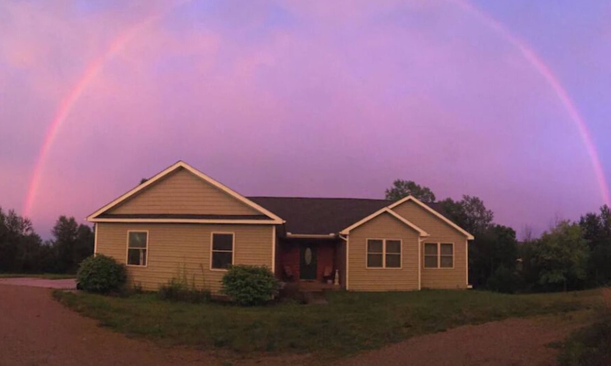Grass Lake Apartment | Basement Bedroom Suite in the country with Hot Tub