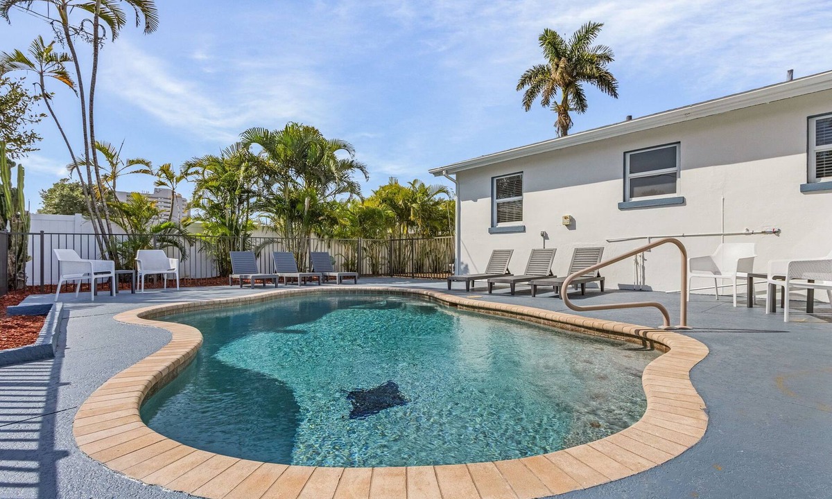 Hills T P House | Beach Haven: 4BR Home, Heated Pool, Walk to Beach!