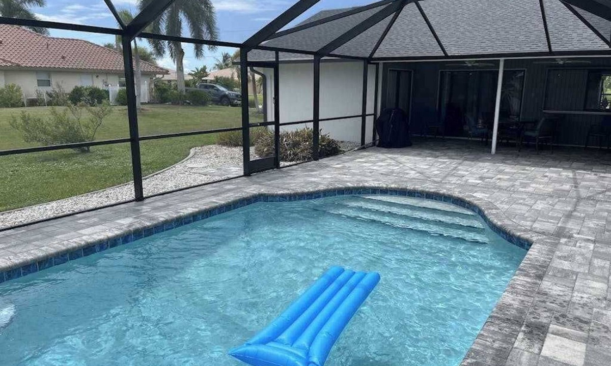 Pebble Beach House | Canal-front home with private pool, grill, patio, AC, W/D & gorgeous views