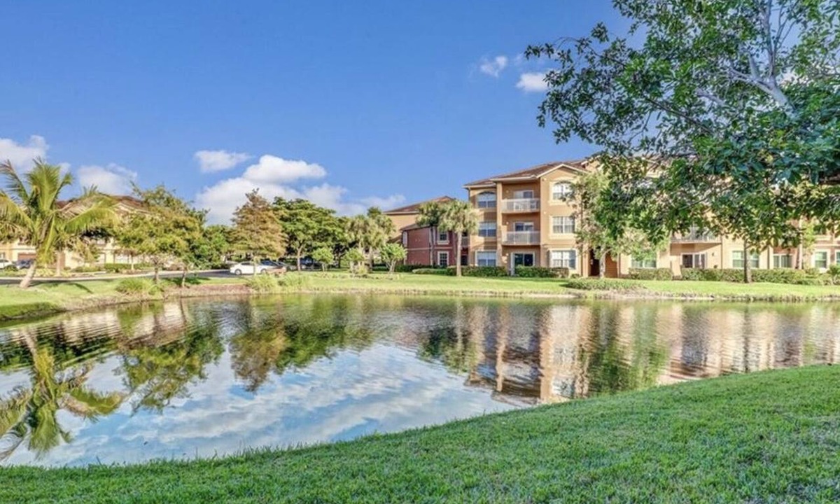 Majestic Palms Condo | Charming lake view 2/2 Florida Condo minutes away from the beach