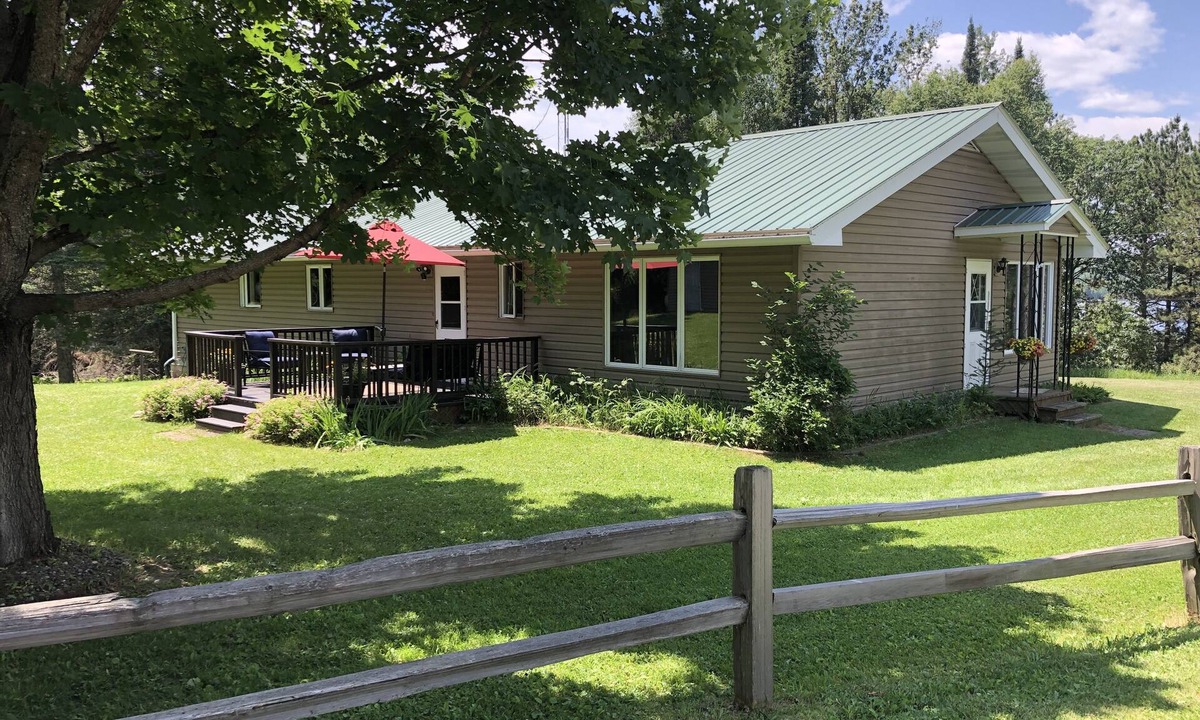 Stambaugh House | Chicaugon Lake home close to great golf and fishing opportunities.