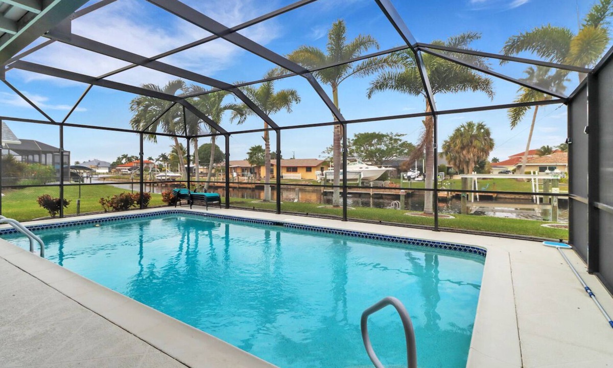 Yacht Club Villa | Coastal Paradise 1013 Modern European Style Waterfront Home w/Gourmet Kitchen & heated Pool