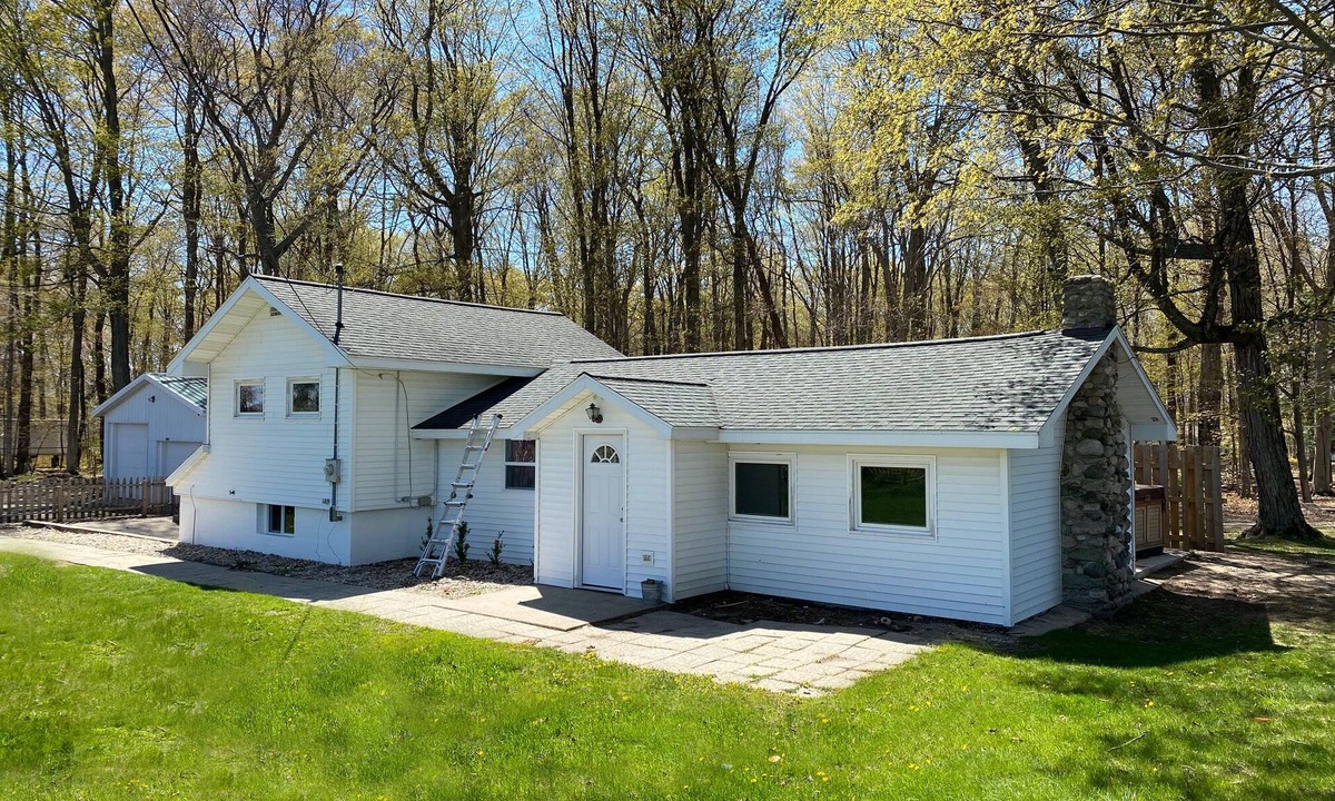 Pentwater Cottage | Cozy 3-bedroom cottage, large yard, minutes from Lake Michigan. Pet friendly.