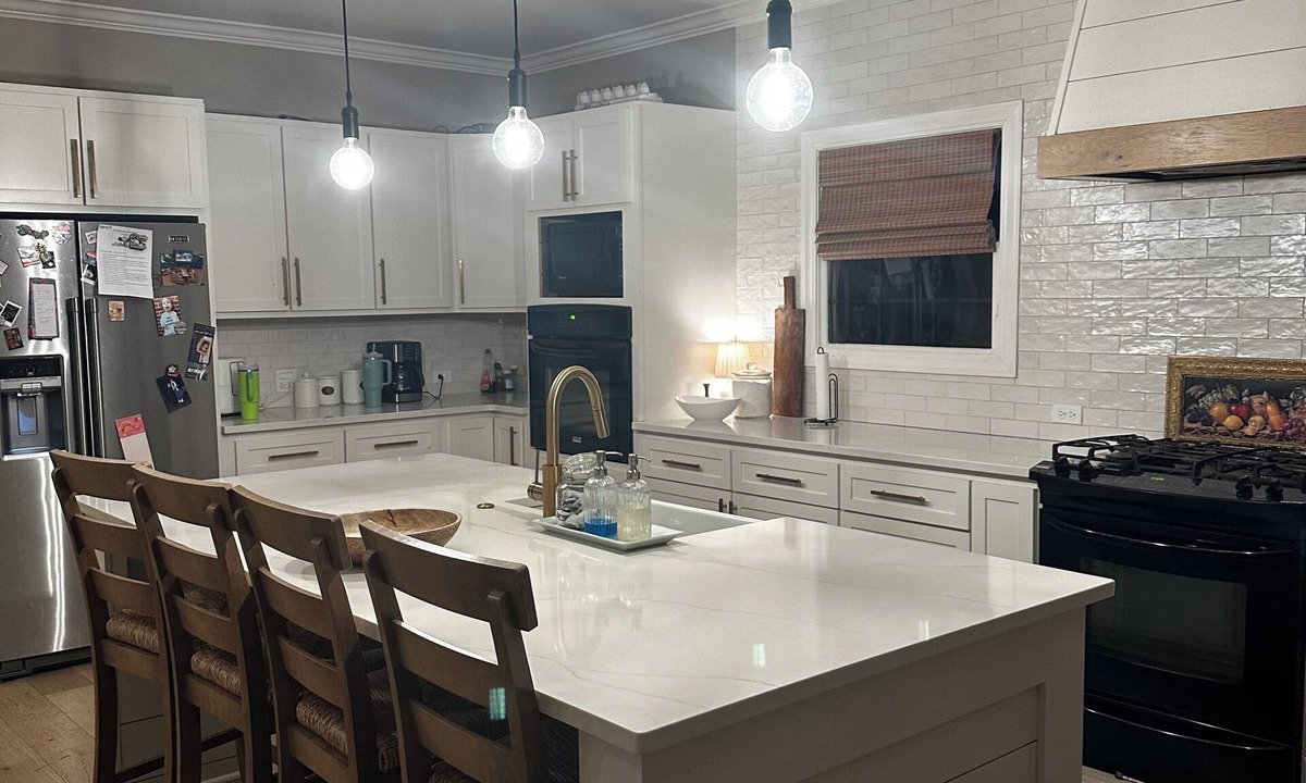 Oxford House | Escape to Serenity: Cozy Ranch Style Home with Charming Wrap-Around Porch.