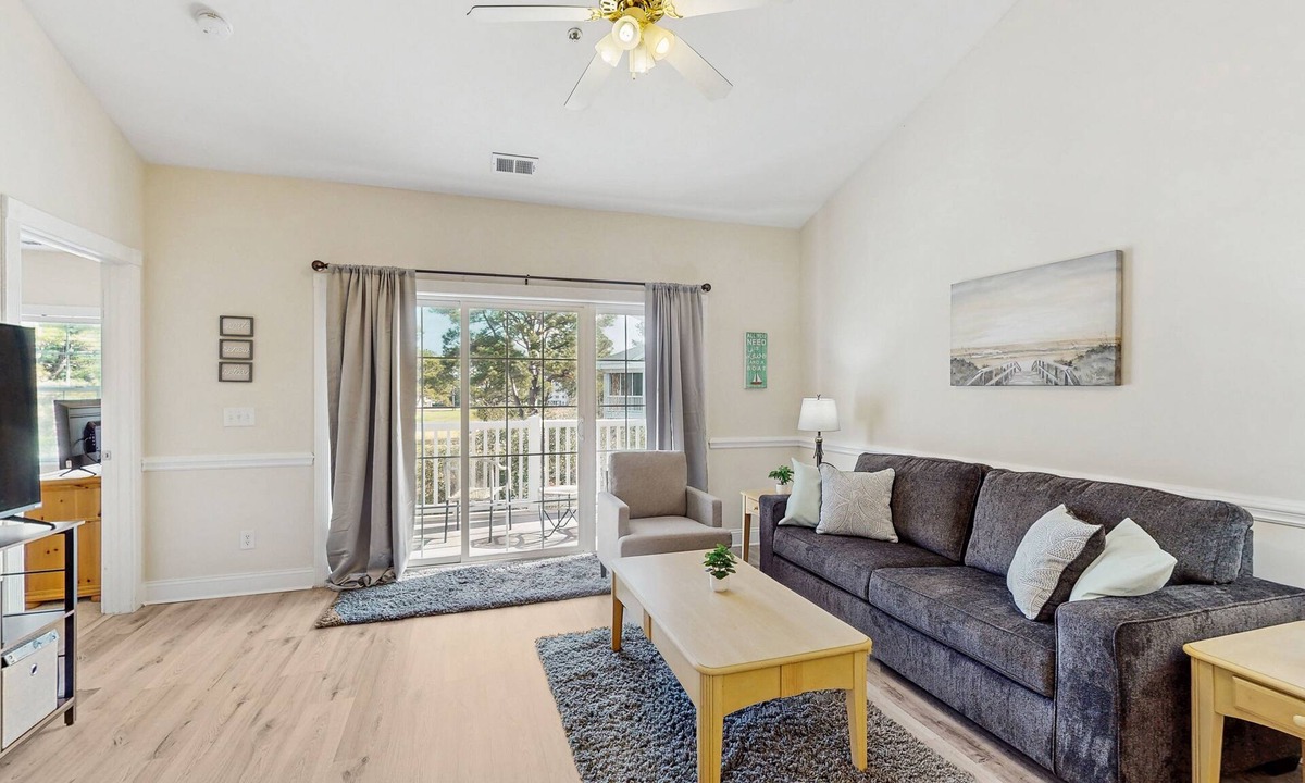 Central Myrtle Beach Condo | Golf course view condo with private balcony, W/D, pool & close to beach