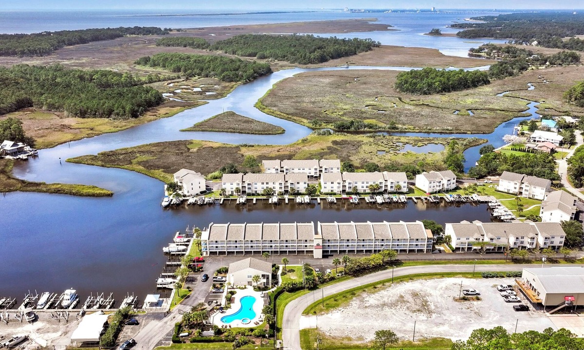 Gulf Park Estates Condo | Harbor Landing in Ocean Springs. Waterfront. Pool and Boat Slip!