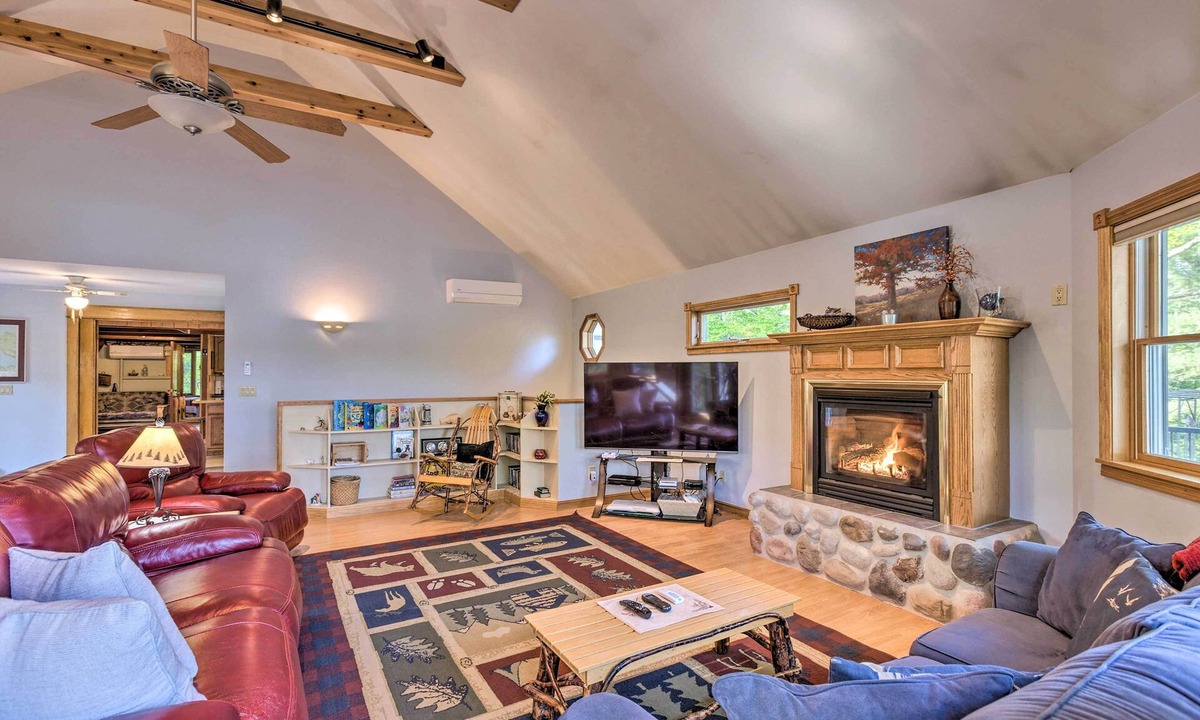Lake Township Cabin | Hot Tub, Sauna, Fireplace, Dock! Lake Honor Cabin