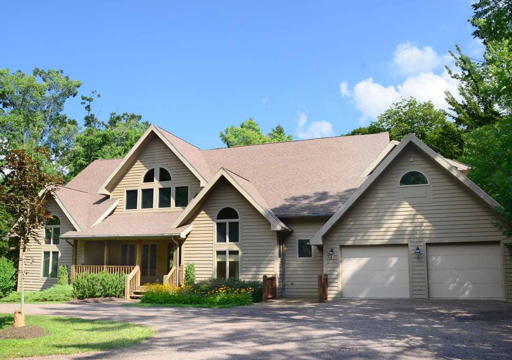 Blakeslee House | Lakefront & pet friendly home in tranquil wooded community w/ private dock!