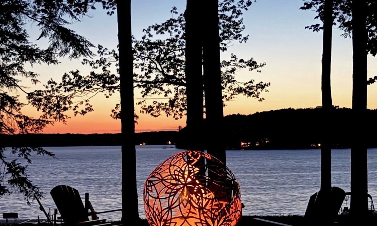 Traverse City Cottage | Long Lake Stone Cottage in Traverse City Frontage Kayaks Fire Pit Pet friendly