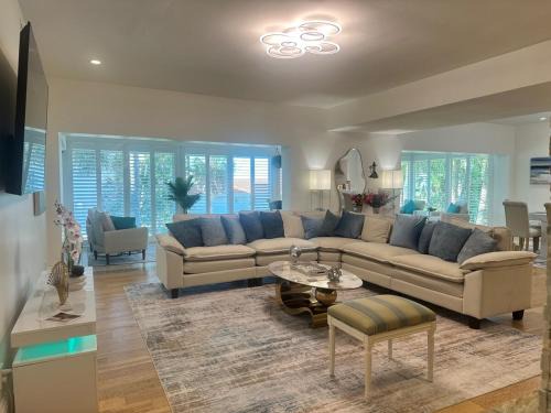Sanibel House | Luxury Waterfront Villa - Pool, Dock, Game Room etc