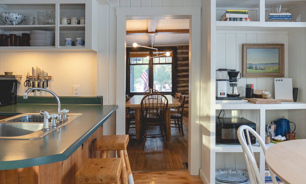 Alanson House | NEW! Log cabin retreat w/modern updates sleeps 14