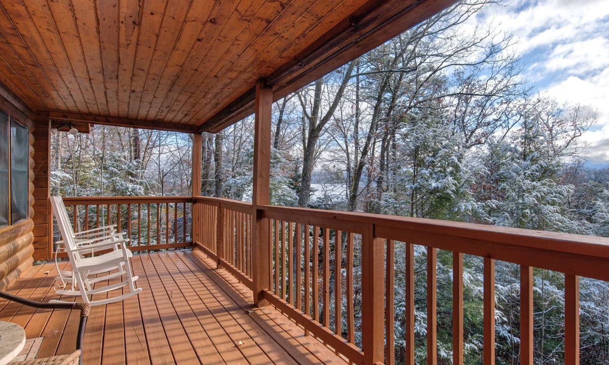 Gatlinburg Cabin | Pet-friendly retreat with tree-top views, a hot tub + an arcade loft!