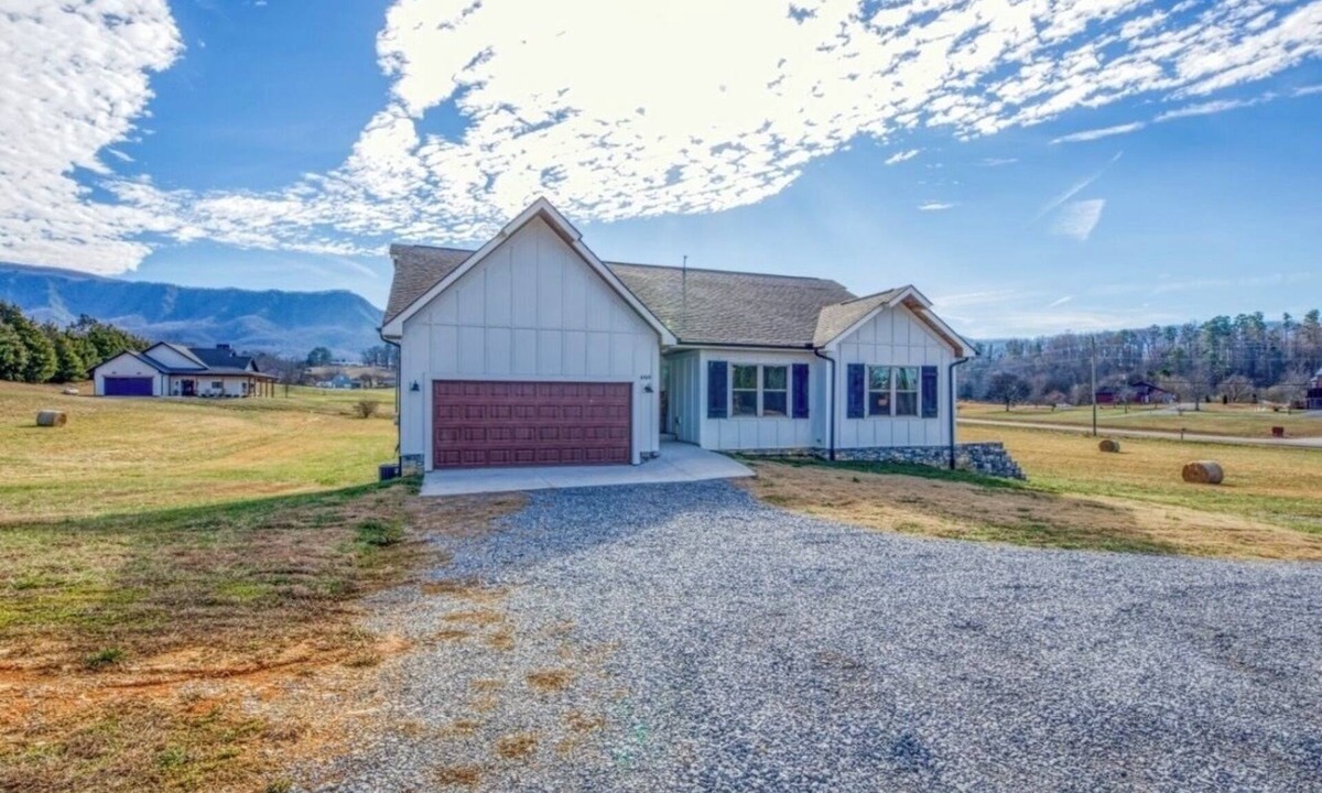 Dandridge House | Recharge with an amazing view of English mountain out each window, or back deck.