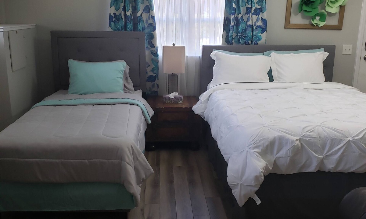 Goldsboro Apartment | Renovated Suite with 1 queen bed and a Twin. Kitchen & bath for your privacy.