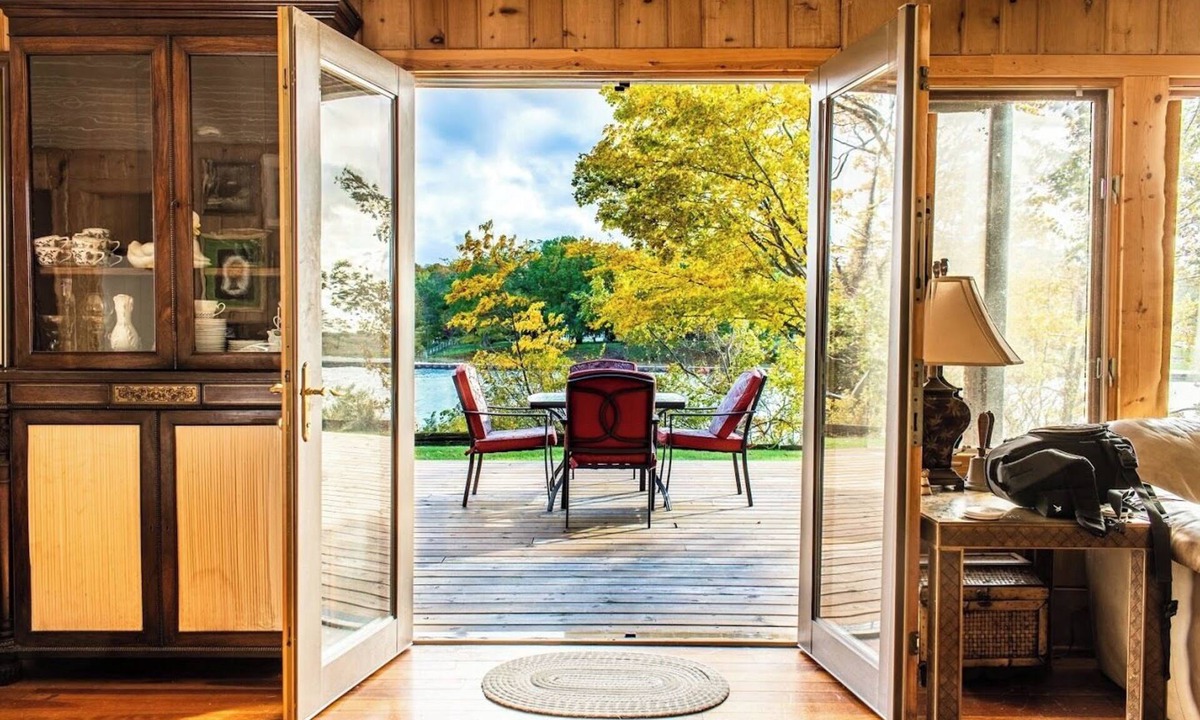 Onekama House | Secluded Home w/private Portage Lk dock & beach next to Lk Michigan beach
