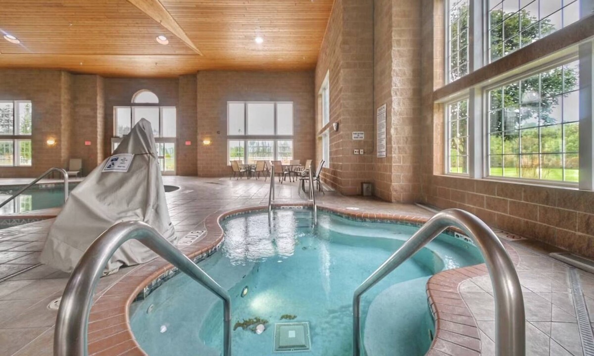 Pembine Hotel | Serene Island Retreat w/Scenic River View! Outdoor Pool, Gym, & Free Parking!
