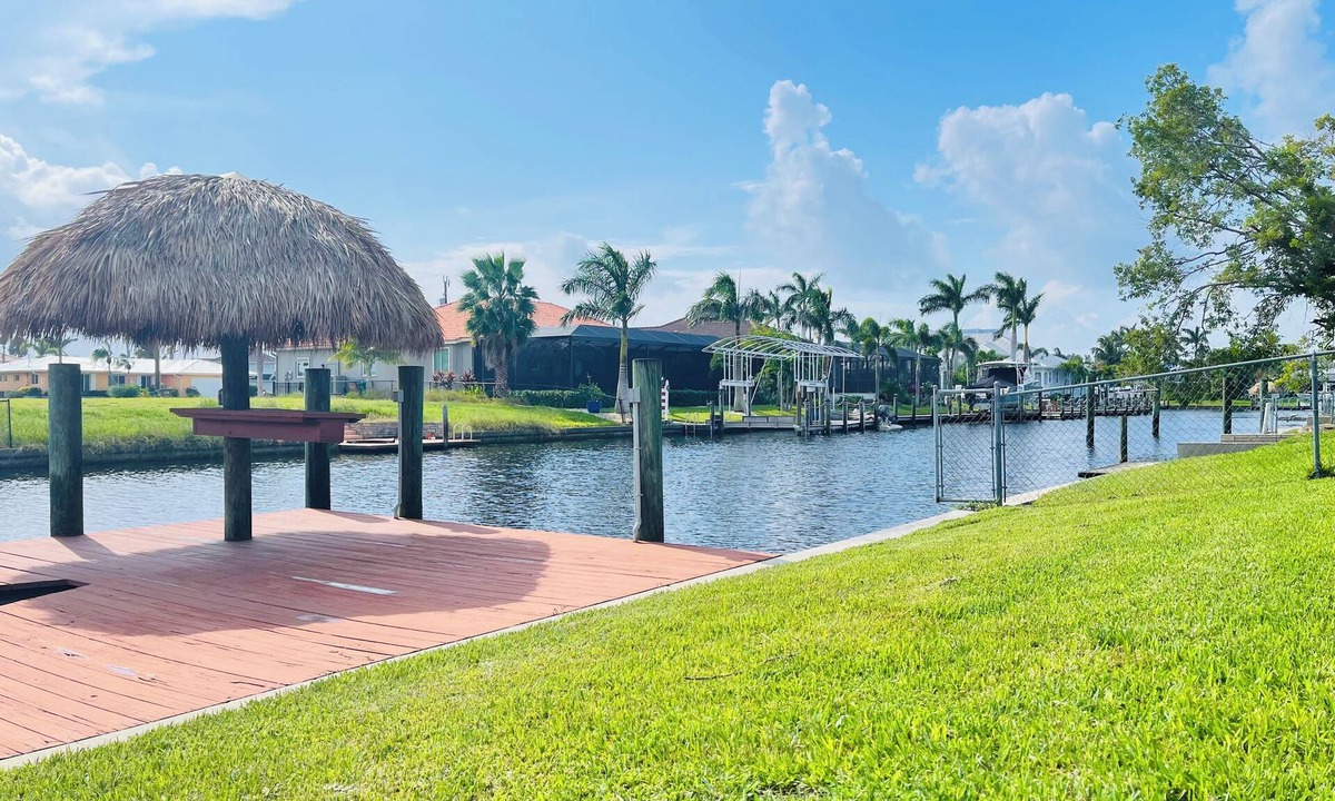Pelican House | Short Distance From Tarpon Point Marina! Gulf Access, Heated Pool, Dock & Tiki!