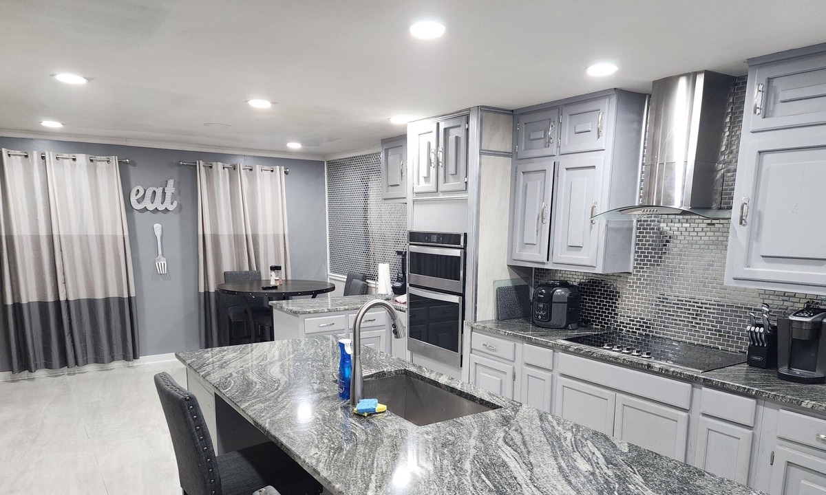 Stone Mountain House | Stunning 4 bed w/ large master and kitchen - 2.5 miles from Stone Mountain Park!