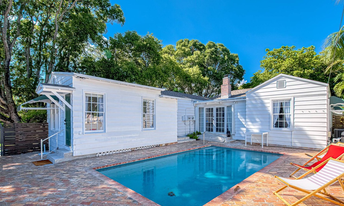 Poiciana Park II Apartment | Stylish, dog-friendly home with a pool, enclosed yard, patio, & central AC