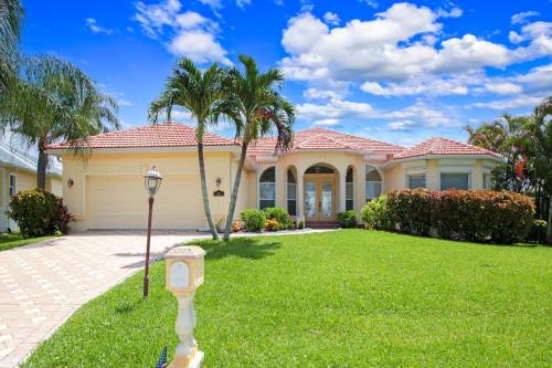 Yacht Club Villa | The Hammock - Beautiful waterfront 4 bedroom home with heated pool
