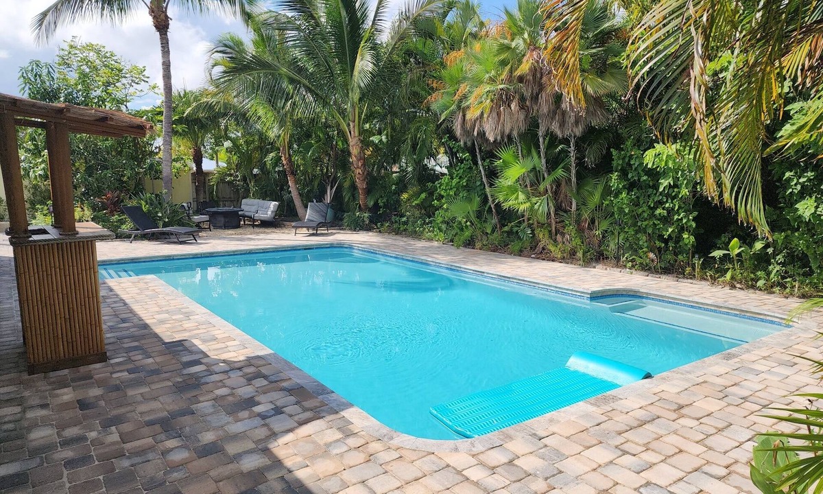 Fort Pierce House | Thumb Point Oasis w/Heated Pool- walk to beach!