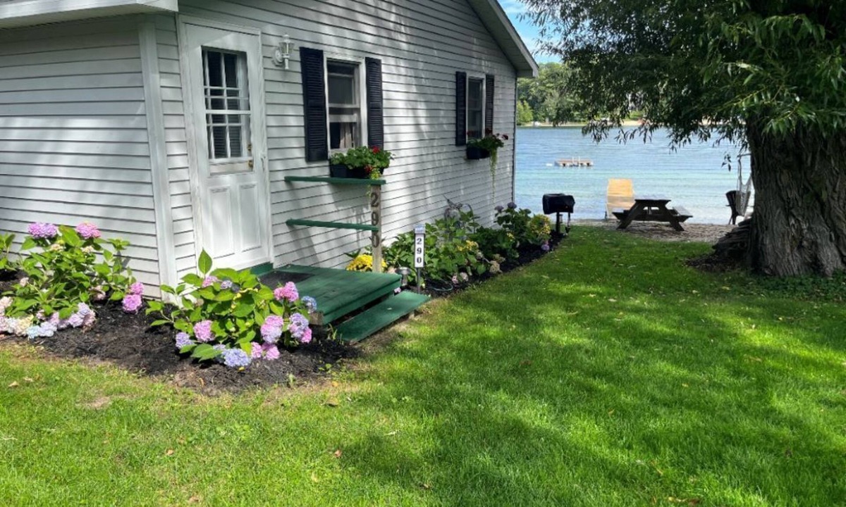 Traverse City Cottage | Traverse City's Silver Lake, DIRECT sandy beach waterfront on all sports lake.