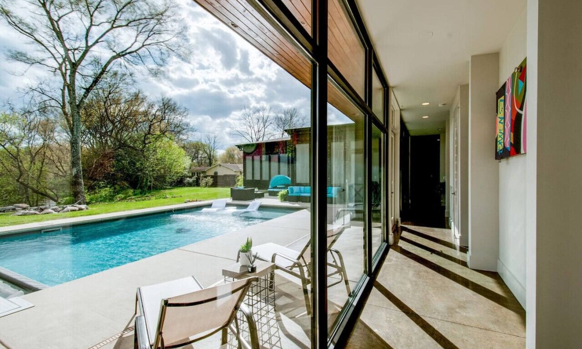 Urbandale Nations House | Unique Modern Ranch with Pool, Hot Tub, Grill & Fireplace
