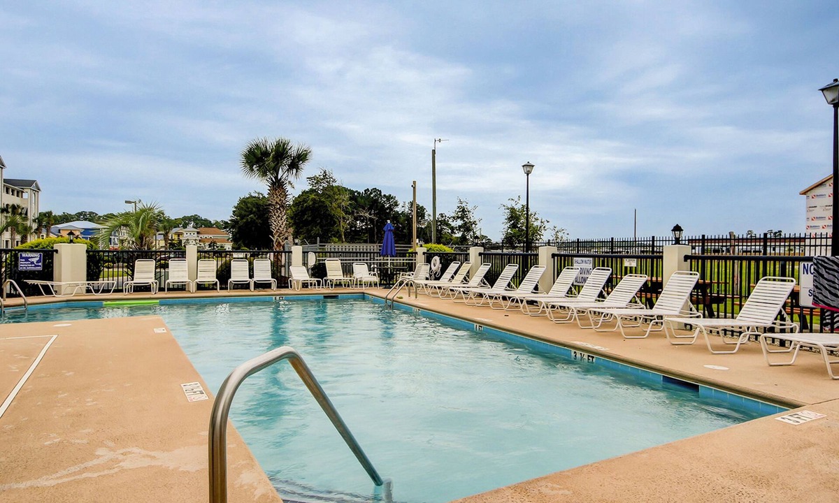 Carolina Yacht Landing Condo | Waterfront condo w/private balcony, shared pool, hot tub & A/C