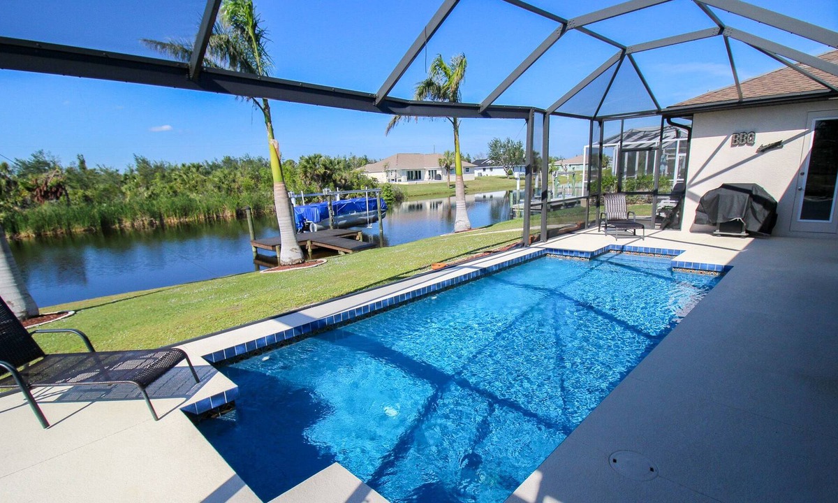 South Gulf Cove House | Waterfront, Private Pool, Three Palms