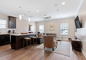Modern 4BR Mid-City home with heated pool & balcony. Free parking, walk to streetcar & parades.
