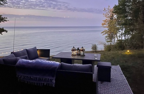 Cheboygan Cottage | 125 ft of Private BEACHFRONT with large, secluded yard & spectacular views!