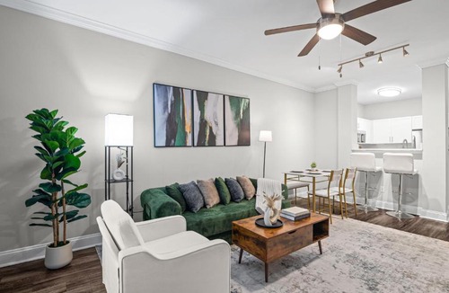 Old Fourth Ward Apartment | 2 Private Condos - Sleeps 8 - Rooftop Pool & Gym with Skyline Views