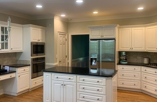 Evans House | 2-story home with grill, patio, outdoor dining, enclosed backyard, & fireplace