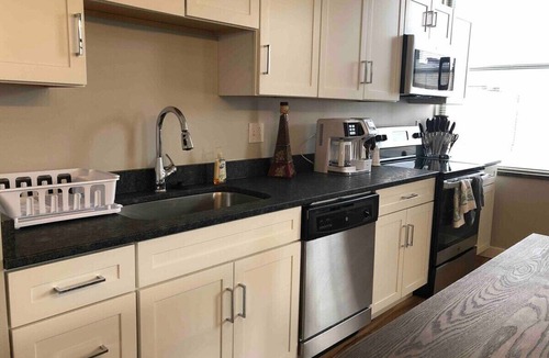 Charleston Apartment | 202 Brand new Downtown living - king - WiFi 70” TV