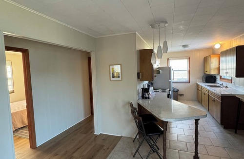 Smyrna Cottage | 3-bedroom cottage on beautiful Big Pine Island Lake. Sandy beach, huge deck.