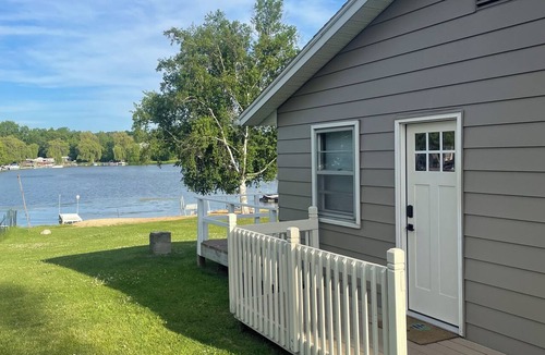 Smyrna Cottage | 3-bedroom cottage on beautiful Big Pine Island Lake. Sandy beach, huge deck.
