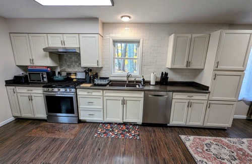 Grawn House | 3 Bedroom house w/lake access, hot tub and pet friendly!