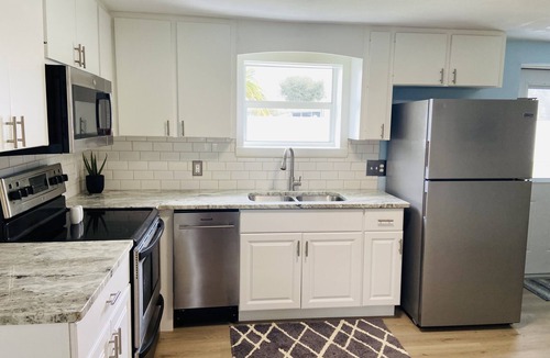 Bay Harbor Estates House | 3 miles to beach, hot tub & fenced yard for pup