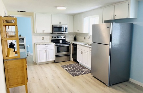 Bay Harbor Estates House | 3 miles to beach, hot tub & fenced yard for pup