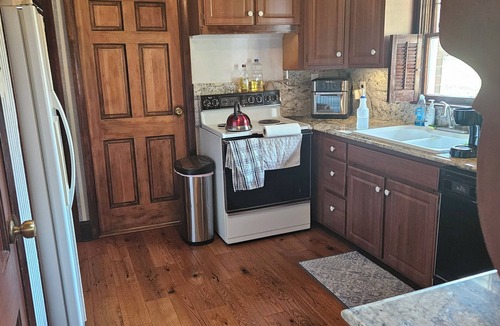 Hilander Park House | 4-bed house w/new HVAC, fiber internet, and private wooded acre in Bristol