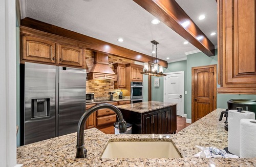 Sevierville Cabin | 4 King beds! Private, Heated Pool! Theater Room! Game Room! Bunks!