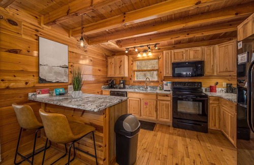 Sevierville Cabin | 4BR, Indoor Children's Playhouse, Hot Tub!