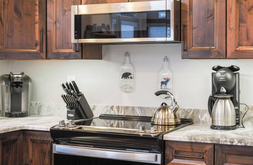 Boyne Falls Condo | 4BR Slopeside | 692 Disciples Village Condo | Fireplace| Ski Cubbies